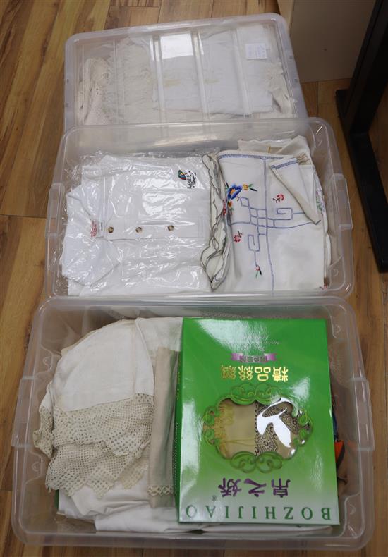 Two boxes of table lace and linen, together with a collection of polo shirts